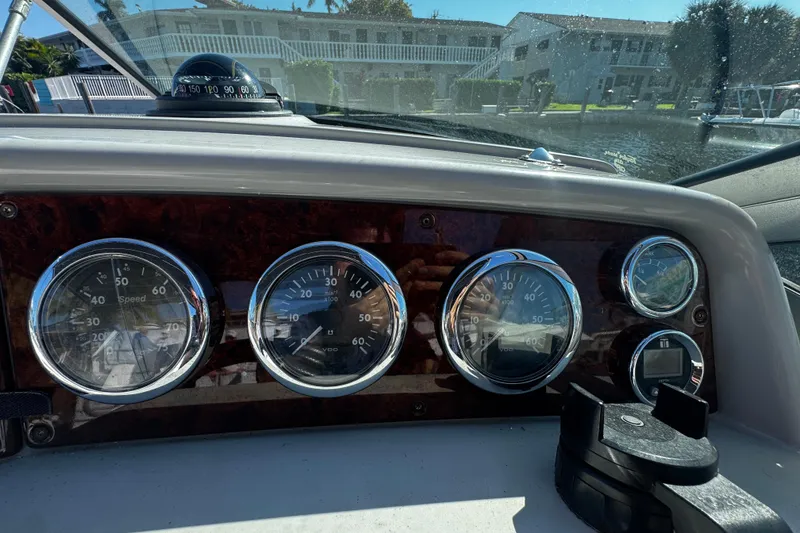 Slide: The Image of Dashboard of a 2004 Formula 280 Sun Sport boat with gauges and compass. - 11