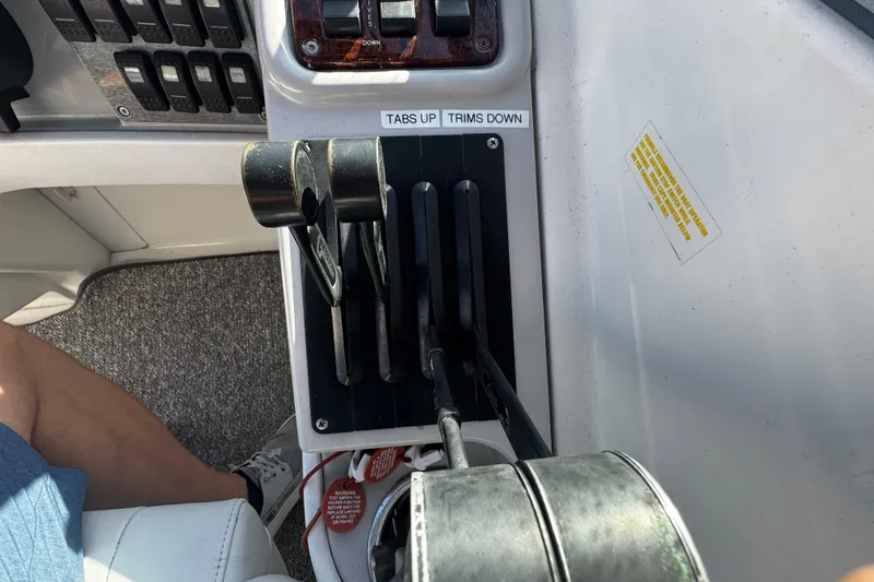 Slide: The Image of Control panel of a 2004 Formula 280 Sun Sport boat with throttle levers. - 14