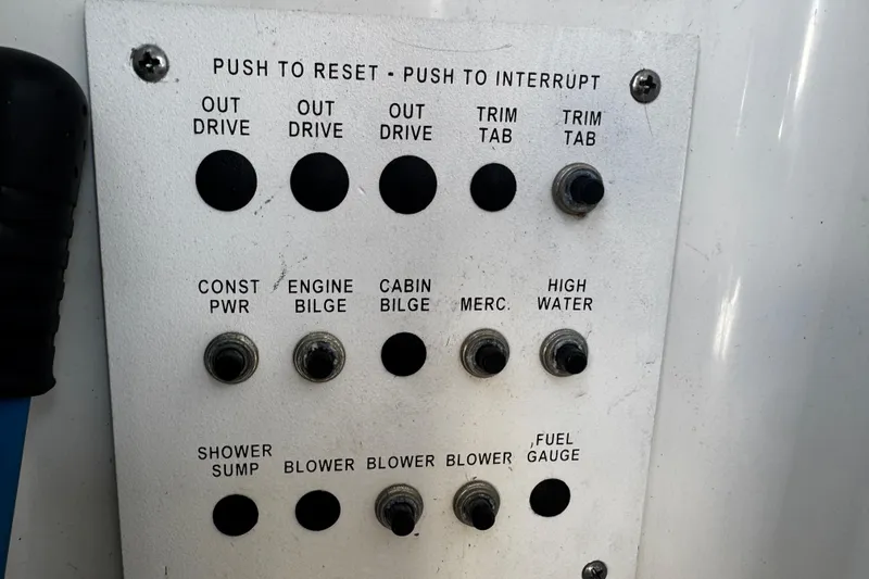 Slide: The Image of Control panel of a 2004 Formula 280 Sun Sport boat with various switches. - 25