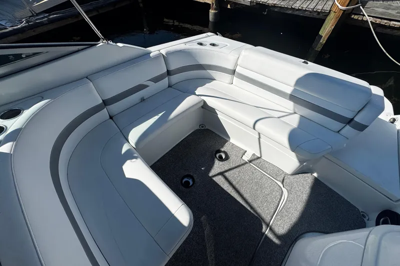 Slide: The Image of 2004 Formula 280 Sun Sport boat interior with white seating and gray accents. - 5