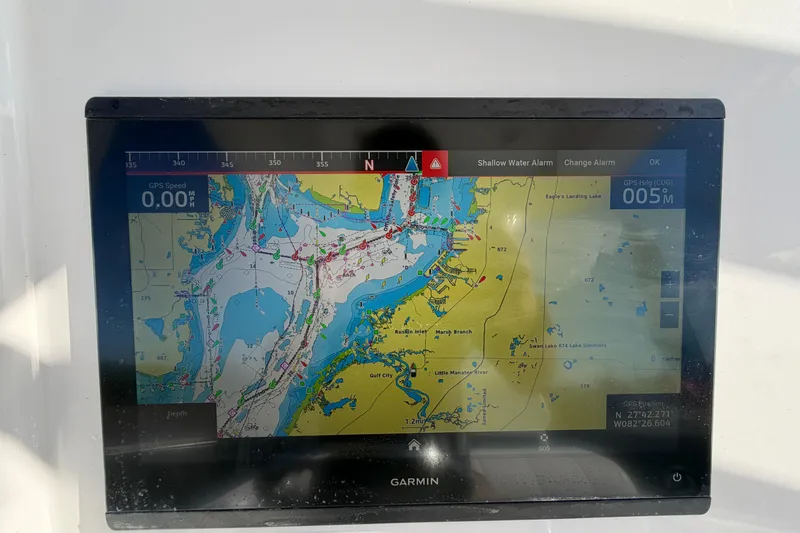 Slide: The Image of Display screen showing fuel usage and trip data on a 2013 Regulator 24 Forward Seating boat. - 34