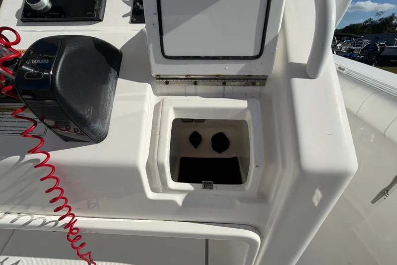 Slide: The Image of Storage compartment in a 2013 Regulator 24 Forward Seating boat. - 41