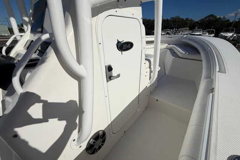 Slide: The Image of 2013 Regulator 24 Forward Seating boat emblem with marlin design. - 46