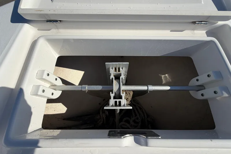 Slide: The Image of 2013 Regulator 24 Forward Seating boat with spacious deck and seating area. - 66