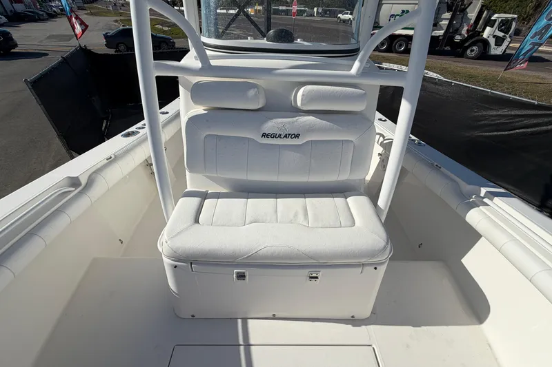 Slide: The Image of White cushioned seating on 2013 Regulator 24 Forward Seating boat. - 73