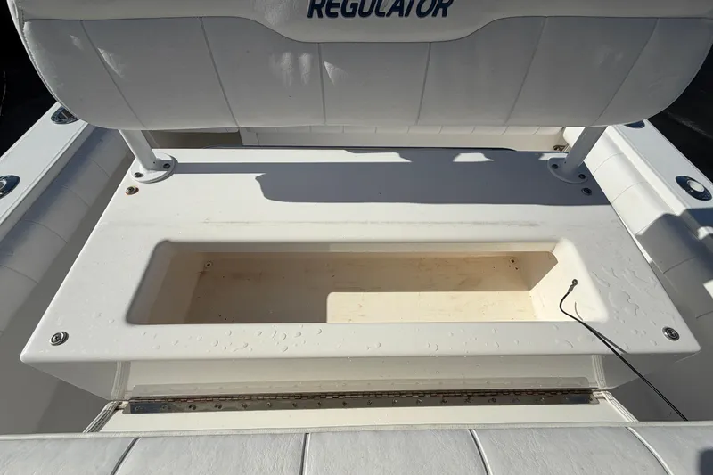 Slide: The Image of 2013 Regulator 24 Forward Seating boat with V8 engine, rear deck view. - 79