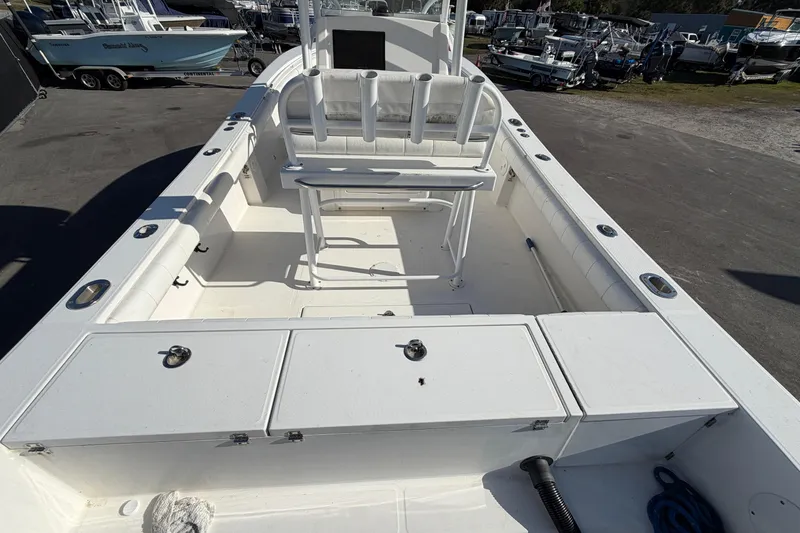 Slide: The Image of 2013 Regulator 24 Forward Seating boat with Yamaha V8 engine on trailer. - 9