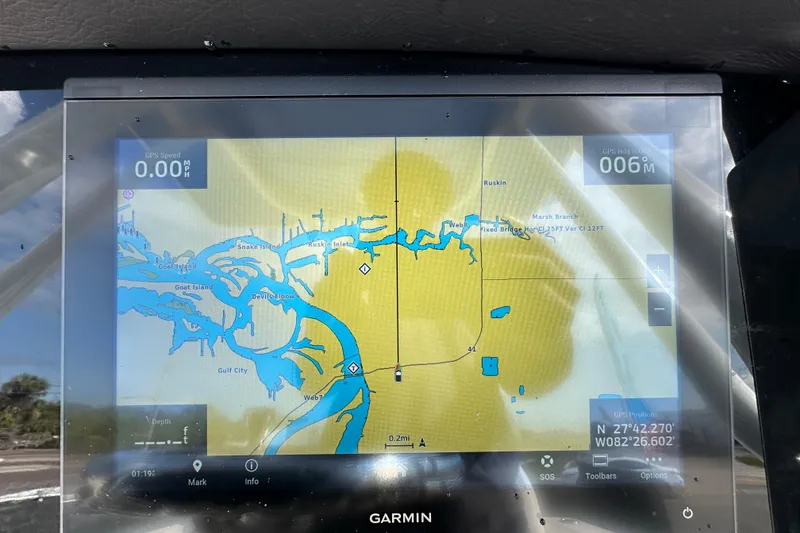 Slide: The Image of Garmin GPS display on 2024 Robalo R232 Explorer, showing navigation map and coordinates. - 22