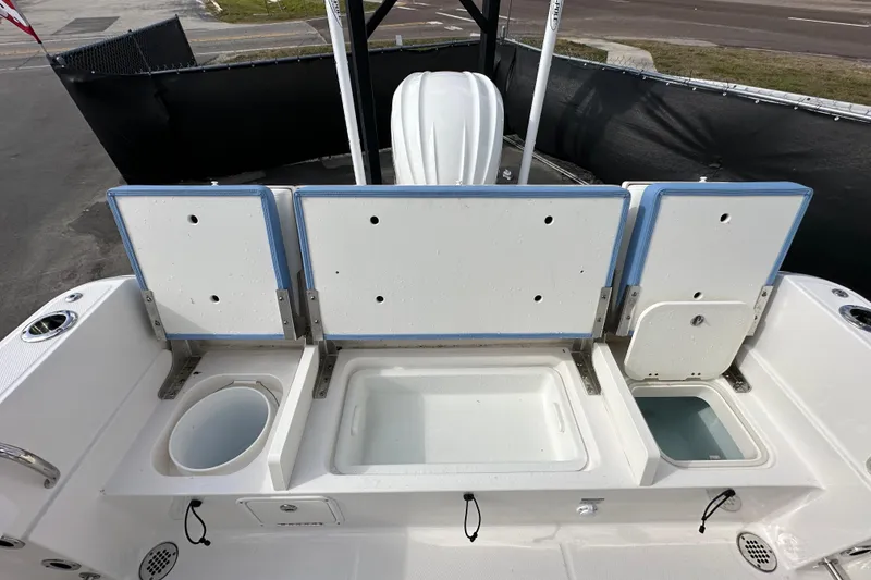 Slide: The Image of 2024 Robalo R232 Explorer boat storage compartments and livewell setup. - 47
