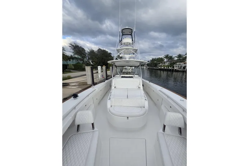 Slide: The Image of 2021 Valhalla Boatworks V-46 docked, showcasing sleek design and modern features. - 25