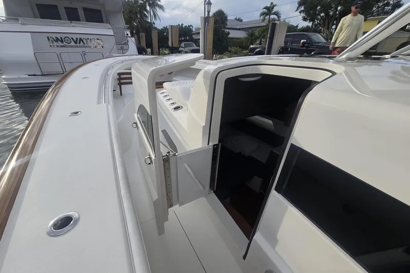 Slide: The Image of 2021 Valhalla Boatworks V-46 with spacious deck and multiple Mercury engines. - 29