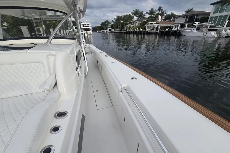 Slide: The Image of 2021 Valhalla Boatworks V-46 on water, showcasing sleek design and advanced features. - 30