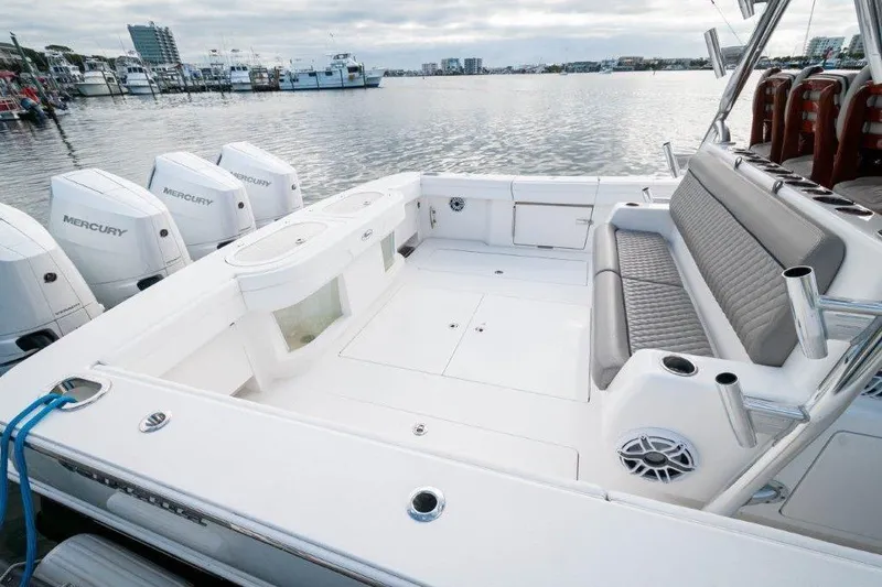 Slide: The Image of 2021 Valhalla Boatworks V-46 with tower, docked under cloudy sky. - 33