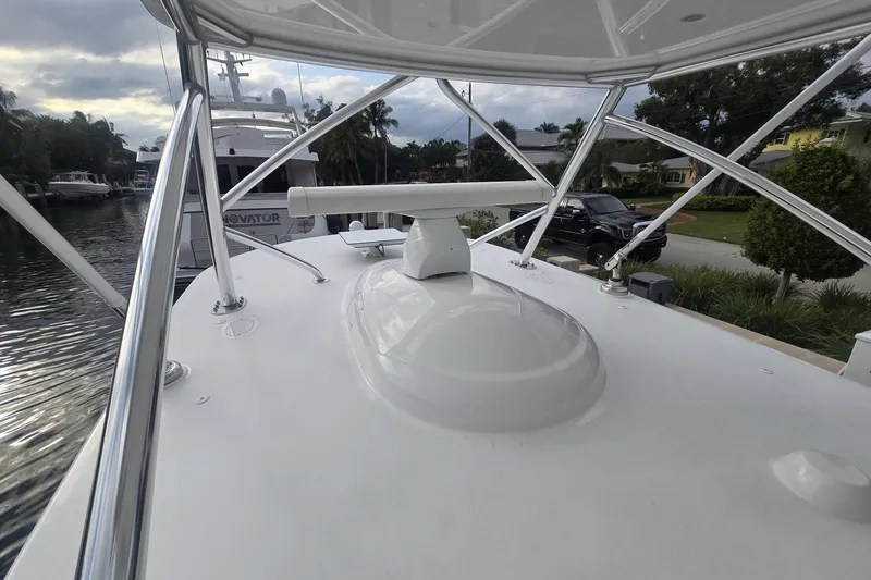 Slide: The Image of 2021 Valhalla Boatworks V-46 with Mercury engines docked by the waterfront. - 34