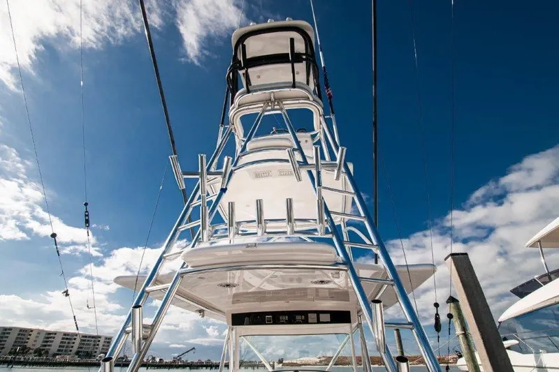 Slide: The Image of 2021 Valhalla Boatworks V-46 with four Mercury outboard engines docked in a canal. - 36
