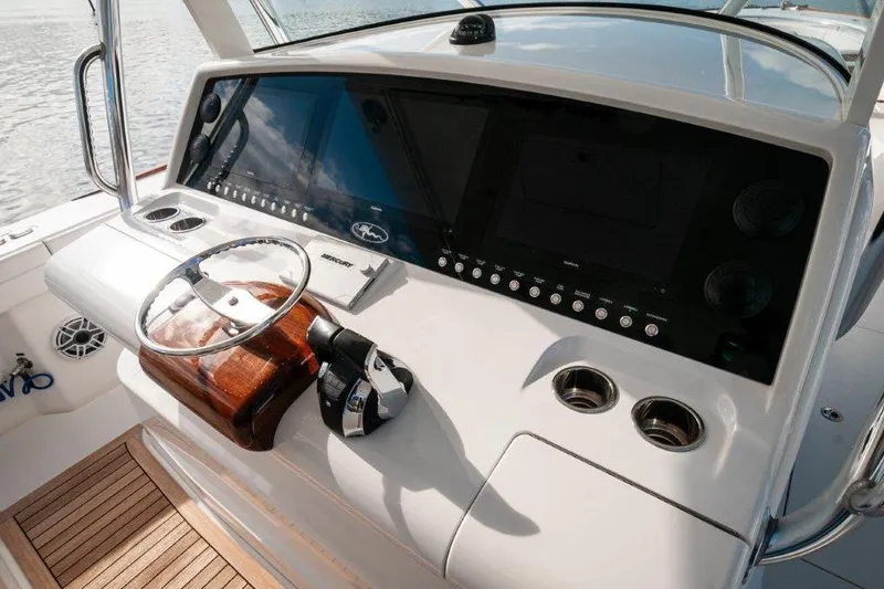 Slide: The Image of 2021 Valhalla Boatworks V-46 interior with luxurious seating and modern helm controls. - 4