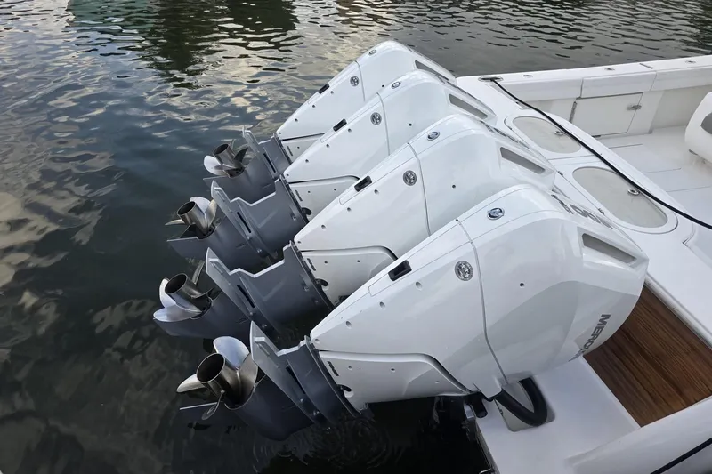 Slide: The Image of 2021 Valhalla Boatworks V-46 helm station with stainless steel supports and clear sky background. - 41