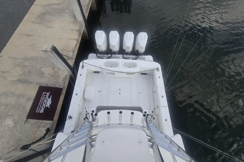 Slide: The Image of Modern kitchen area in 2021 Valhalla Boatworks V-46 with microwave and stovetop. - 43