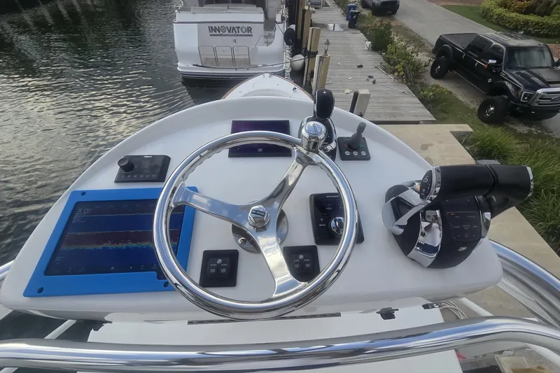 Slide: The Image of 2021 Valhalla Boatworks V-46 interior with control panels and safety certification. - 44