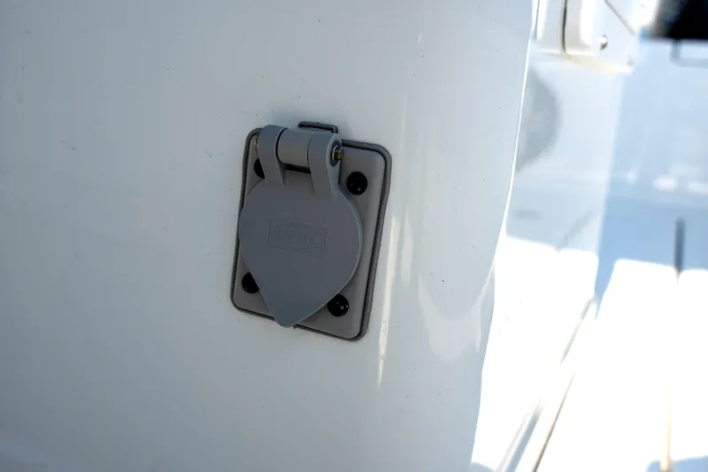 Slide: The Image of Freeman 28 boat detail, 2024 model, featuring a Hubbell electrical outlet cover. - 22