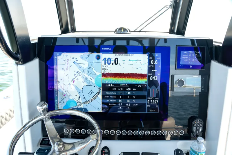 Slide: The Image of Dashboard of 2024 Freeman 28 boat with navigation and sonar display. - 25