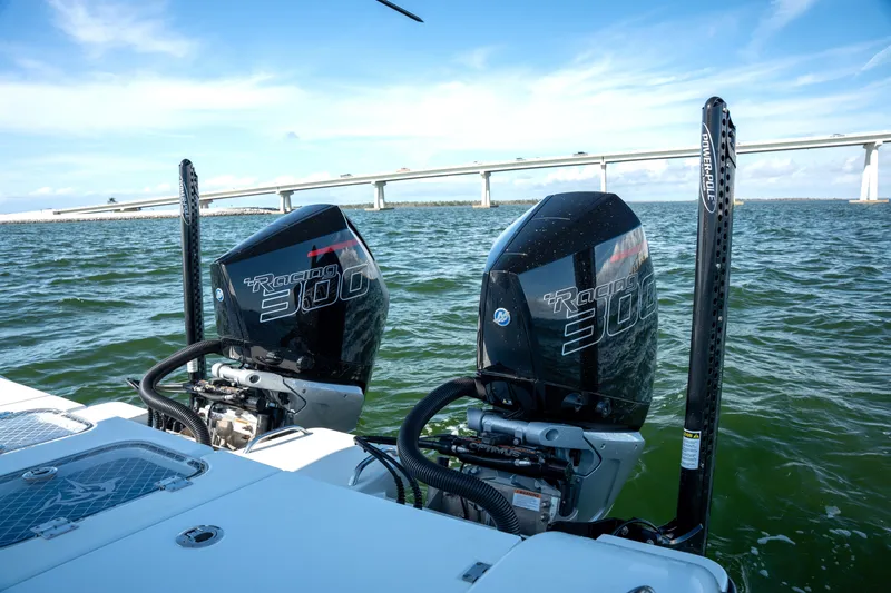 Slide: The Image of Freeman 28 boat with twin Racing 300 outboard motors on the water, 2024 model. - 32