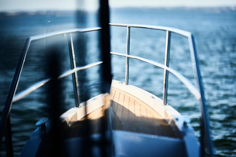 Slide: The Image of Bow of Northman 1050 boat on water, 2025 model, reflecting sunlight. - 17