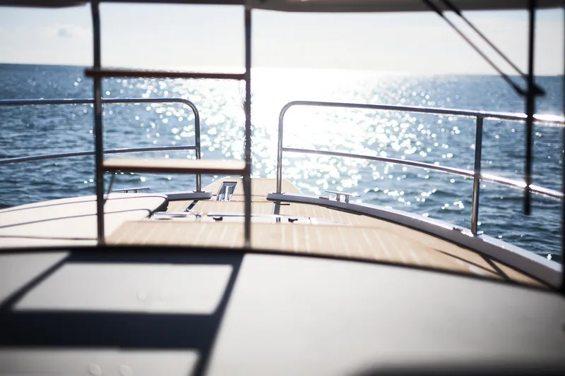 Slide: The Image of Front deck of 2025 Northman 1050 yacht with ocean view. - 20