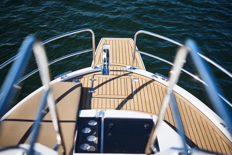Slide: The Image of Bow view of 2025 Northman 1050 yacht with sleek deck design. - 19