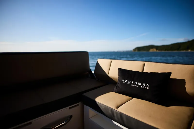 Slide: The Image of Luxurious Northman 1050 boat interior with scenic ocean view, 2025 model. - 24