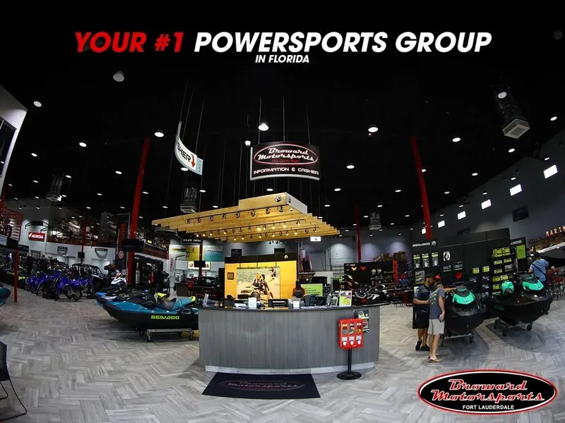 Slide: The Image of A powersports store in Florida featuring various watercraft and accessories in the showroom. - 5