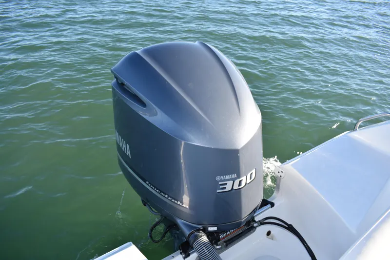Slide: The Image of Yamaha 300 outboard motor on 2020 Sea Hunt Ultra 255 SE boat in water. - 19