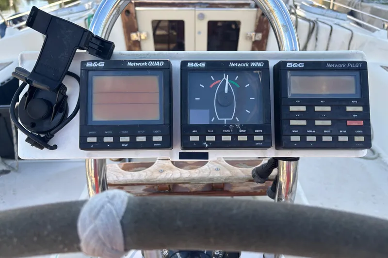 Slide: The Image of B&G navigation instruments on a 1997 Caliber 40LRC yacht dashboard. - 11