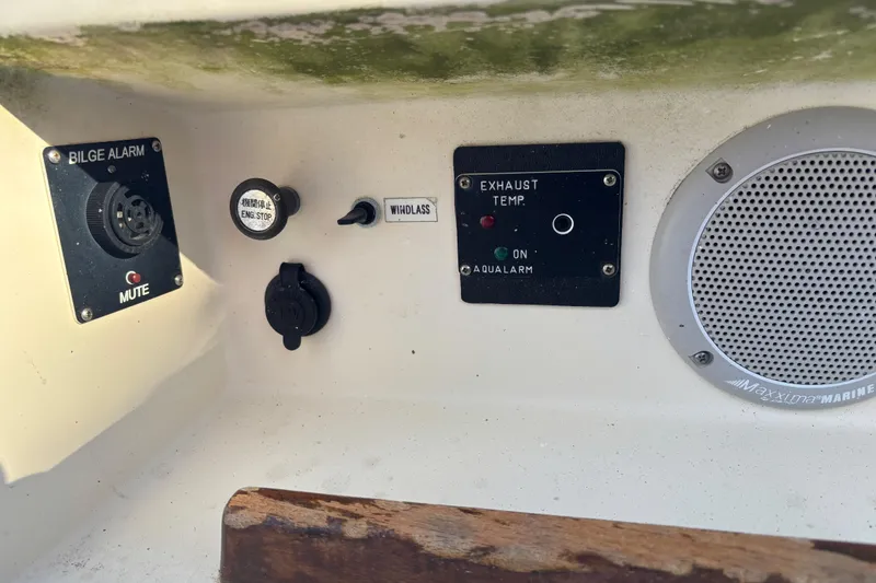 Slide: The Image of Control panel of a 1997 Caliber 40LRC boat with bilge alarm and exhaust temperature indicators. - 8