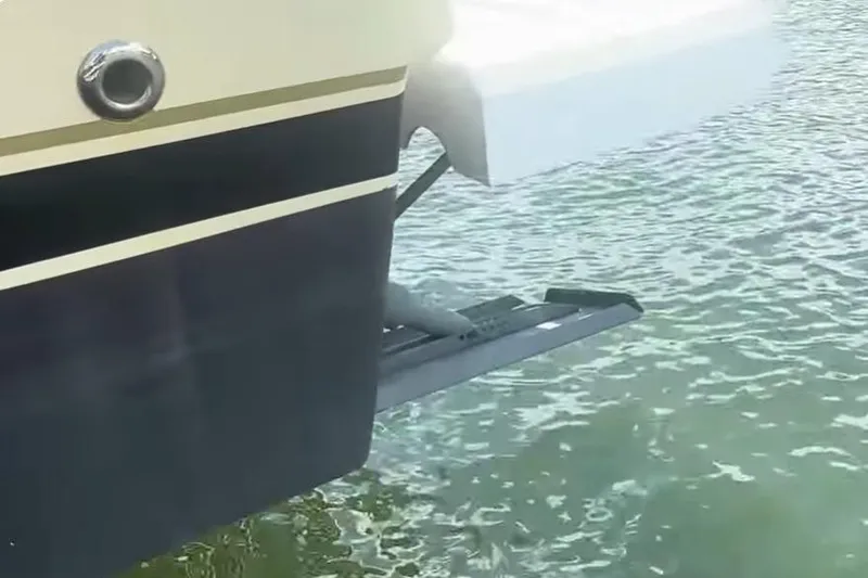 Slide: The Image of 2007 Tiara Yachts 3000 Open stern detail with swim platform over water. - 19