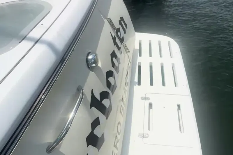 Slide: The Image of 2007 Tiara Yachts 3000 Open, rear view with water backdrop. - 4