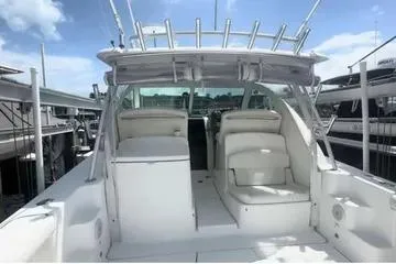 Slide: The Image of Control panel of a 2007 Tiara Yachts 3000 Open with navigation and communication equipment. - 9