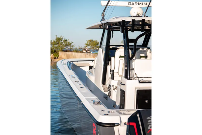 Slide: The Image of 2026 Barker Boatworks 40HPC in water, showcasing sleek design and advanced features. - 42