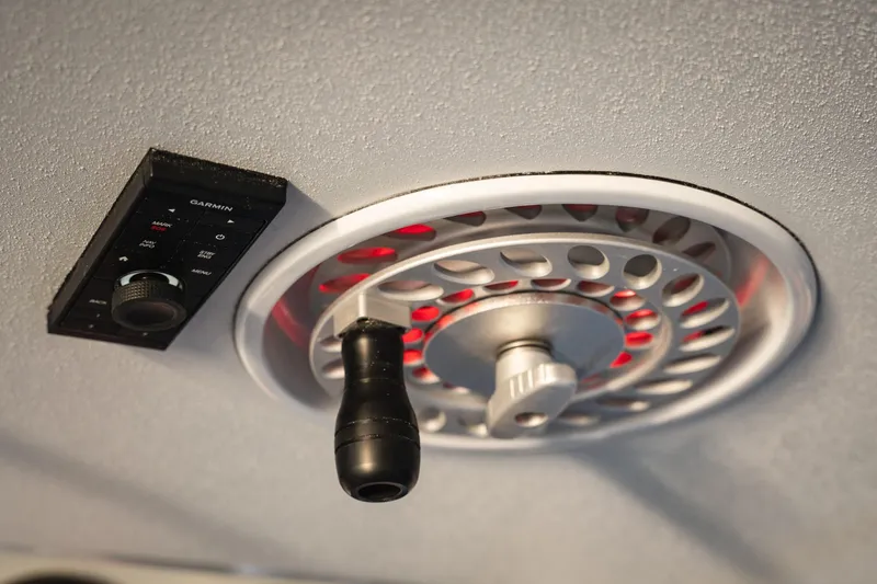 Slide: The Image of Control panel and vent in 2026 Barker Boatworks 40HPC boat interior. - 59