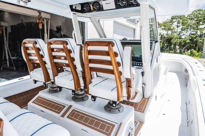 Slide: The Image of Luxury interior of 2026 Barker Boatworks 40HPC with elegant seating and modern design. - 17