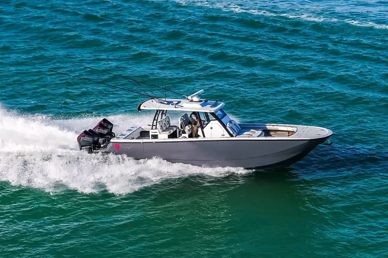 Slide: The Image of 2026 Barker Boatworks 40HPC cruising swiftly on open water. - 19