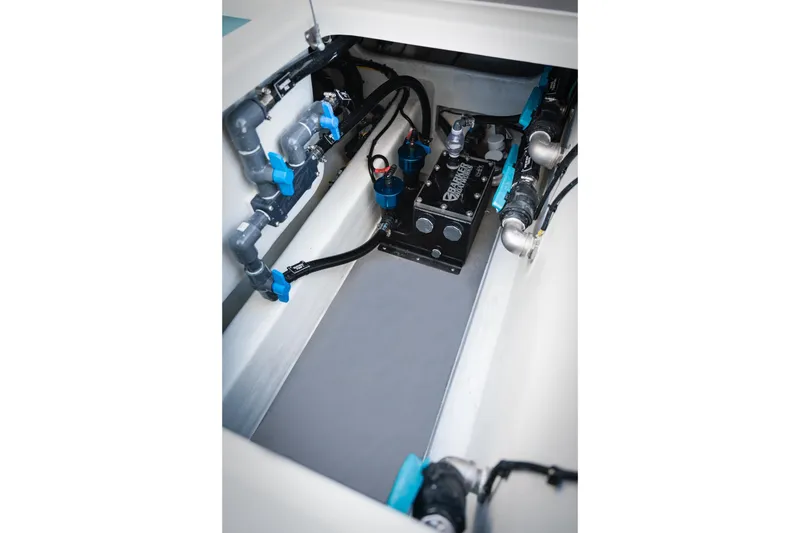 Slide: The Image of 2026 Barker Boatworks 40HPC engine compartment with advanced plumbing and mechanical systems. - 30