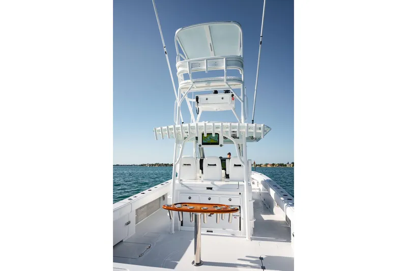 Slide: The Image of 2026 Barker Boatworks 40HPC center console with tower on open water. - 32