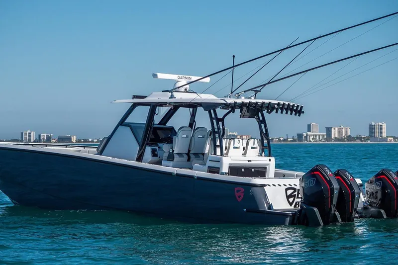 Slide: The Image of 2026 Barker Boatworks 40HPC on water, featuring multiple outboard engines and sleek design. - 45