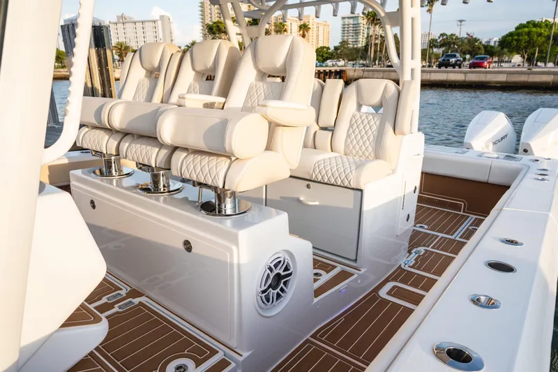 Slide: The Image of 2026 Barker Boatworks 40HPC luxury seating, featuring elegant design and premium materials. - 51