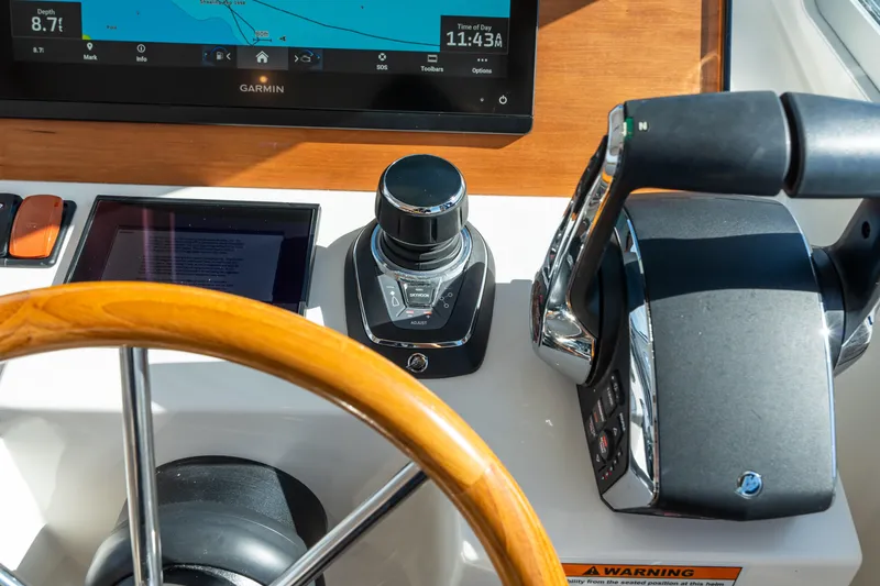 Slide: The Image of Helm of 2023 Back Cove 340 with Garmin display and controls. - 36