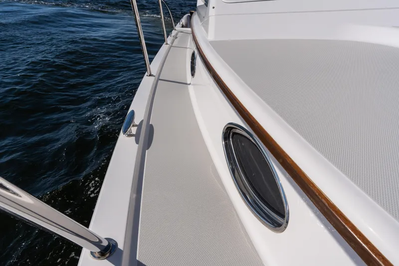 Slide: The Image of 2023 Back Cove 340 boat deck with sleek design and ocean view. - 78