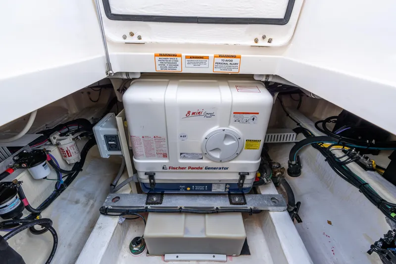 Slide: The Image of Engine compartment of 2023 Back Cove 340 with Fischer Panda generator. - 82