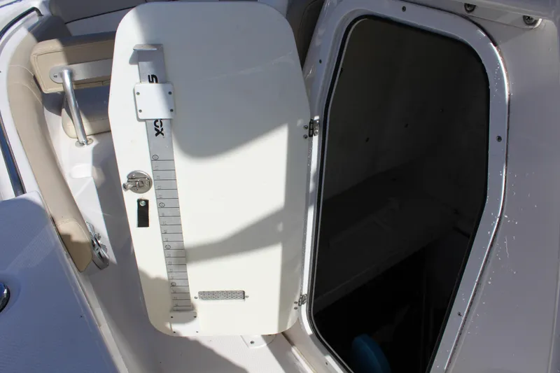 Slide: The Image of 2018 Sea Fox 226 Commander boat storage compartment with open hatch. - 17