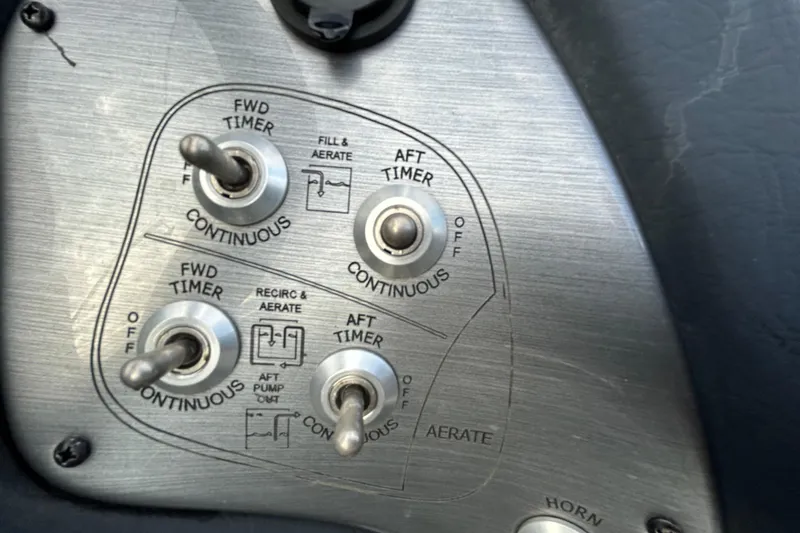 Slide: The Image of 2014 Bass Tracker PRO TEAM 175 TXW boat on trailer at sunset by a lake. - 13